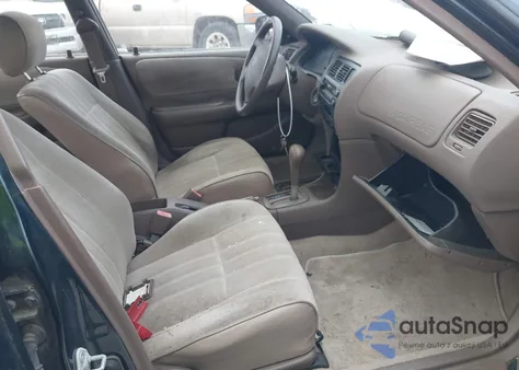 1997 Toyota Corolla Ce из США, поврежденный, VIN 2T1BA02EXVC221813